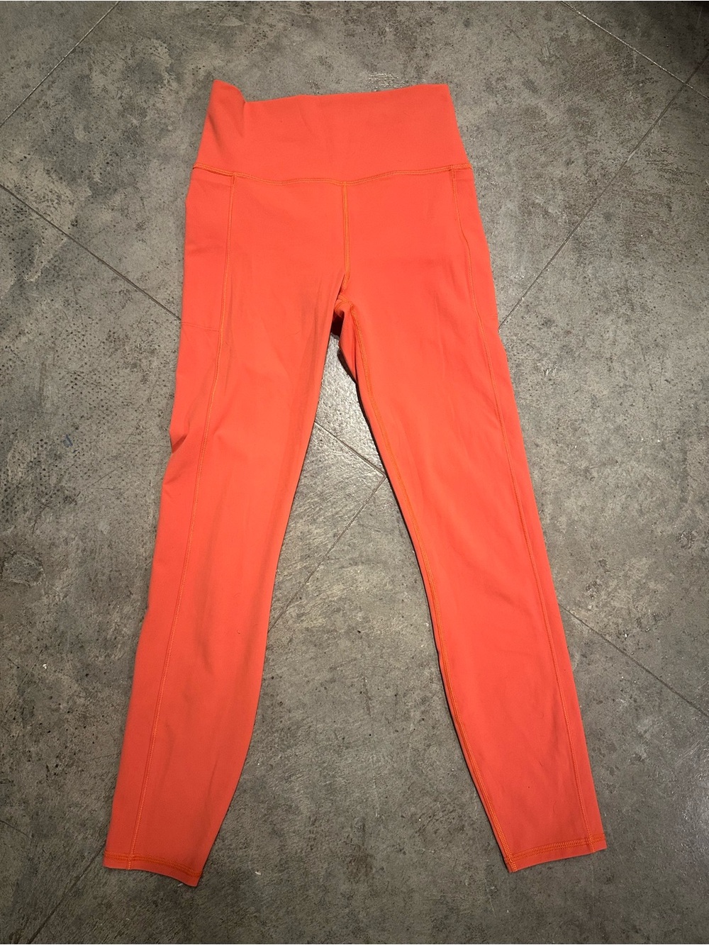 Vuori High-Waist Leggings in Coral Orange